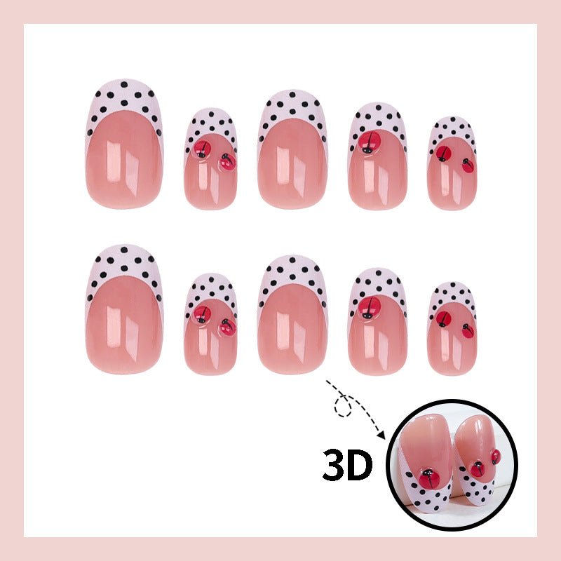 Artificial nail set with playful dots and eye-catching accents Stornfield
