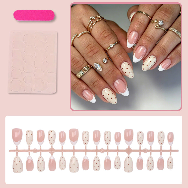 Artificial nails with elegant dots and glamorous accents Stornfield