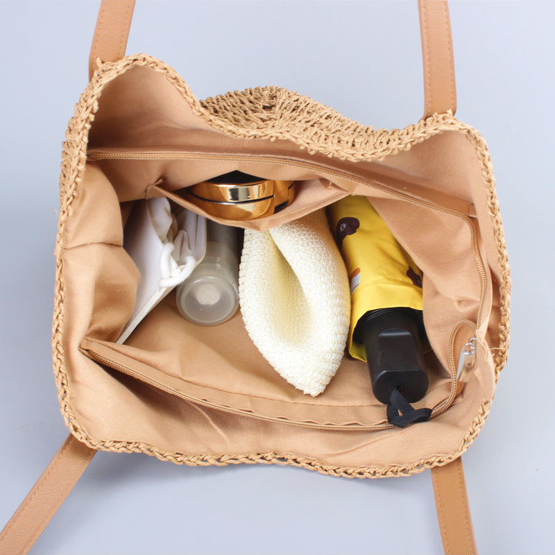 Casual bag made of handwoven straw with wide leather handles Stornfield