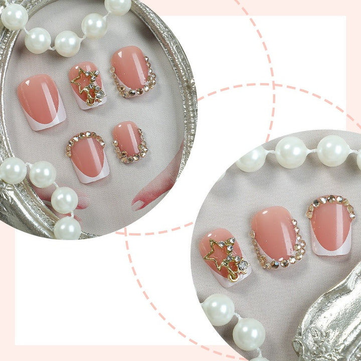 Artificial nail set with elegant flower design and glitter accents Stornfield
