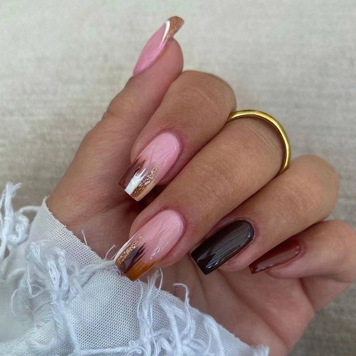 Elegant Artificial Nail Extensions with Ombre and Glitter Details Stornfield