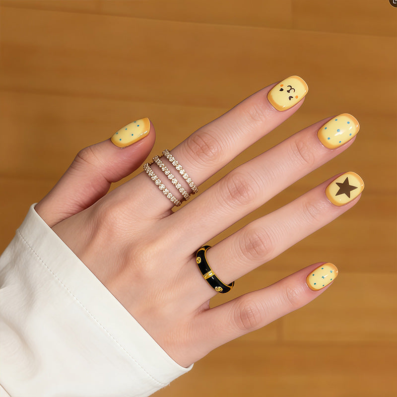 Artistic Press-On Nail Set with Playful Character Designs Stornfield