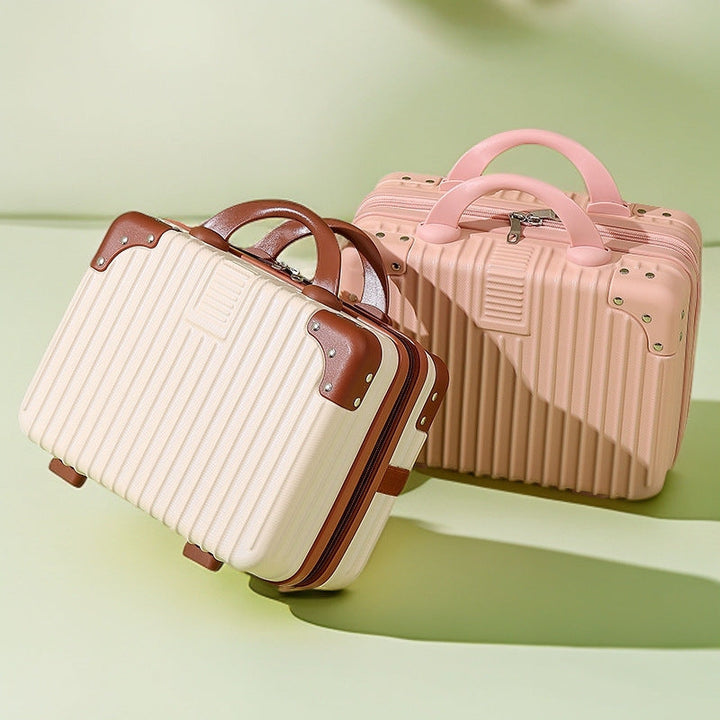 structured hard-shell vanity travel case with faux-leather corner reinforcements and dual top handles Stornfield