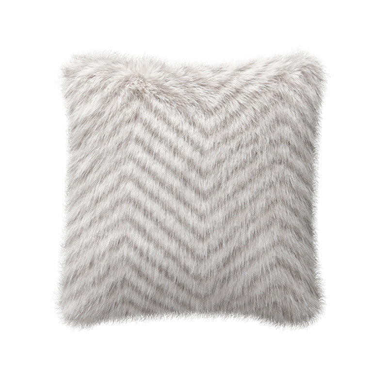 Square decorative cushion made of soft faux fur with inner cushion