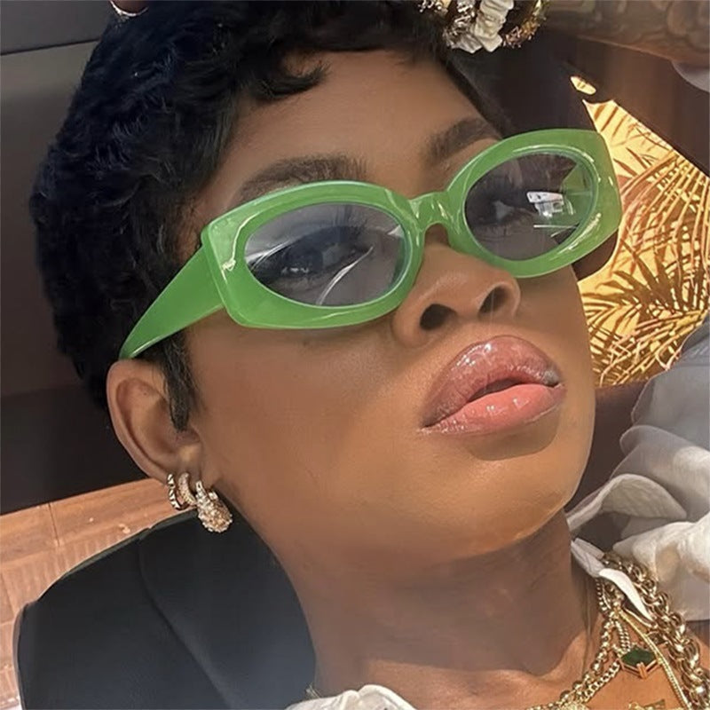 Ladies trendy sunglasses with unique, curved frame Stornfield
