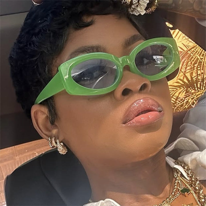 Ladies trendy sunglasses with unique, curved frame Stornfield