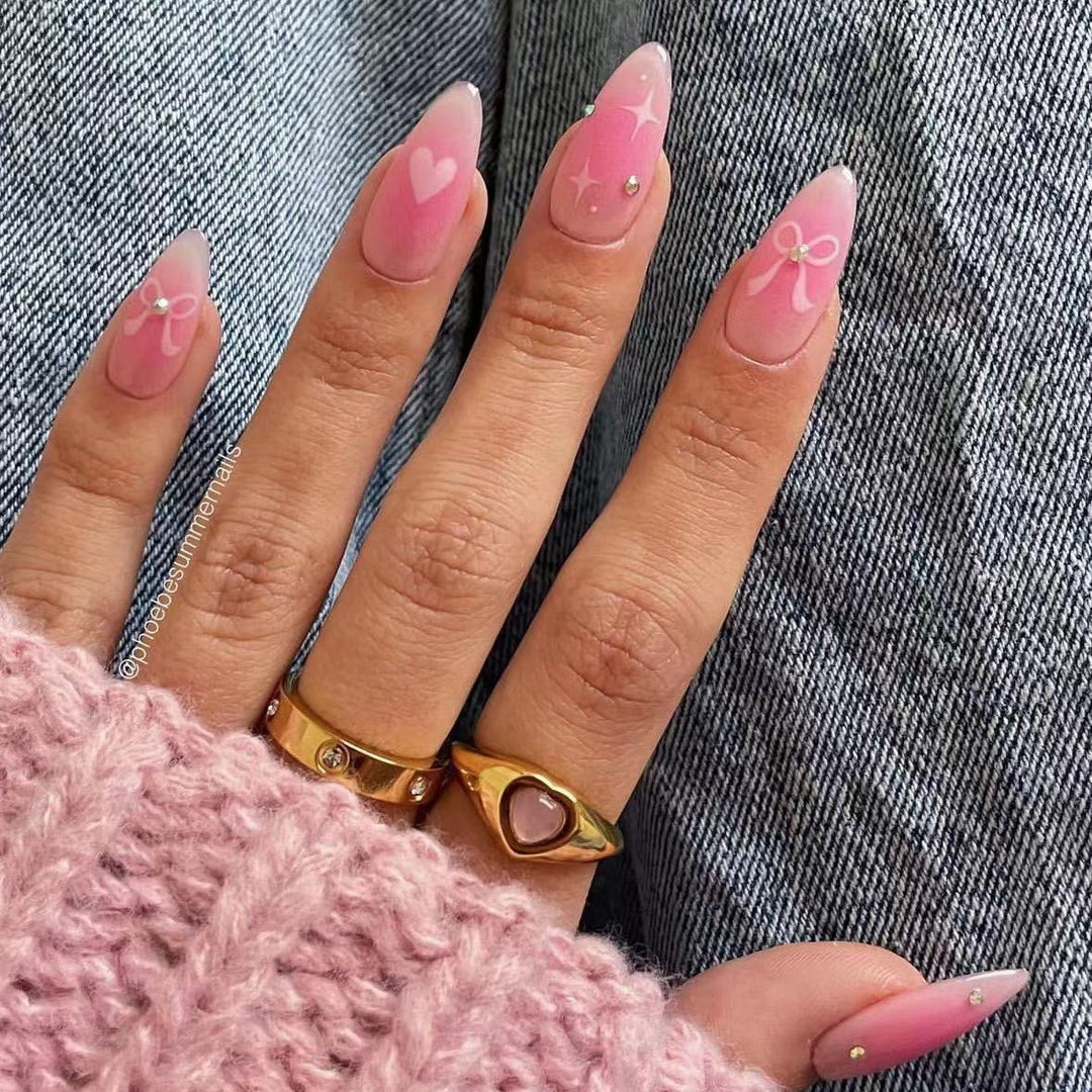 Artificial nail set with romantic heart design and embellished accents Stornfield
