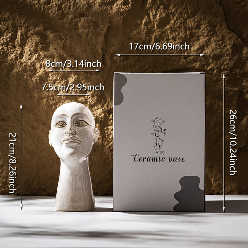 Hand-glazed contemporary sculptural head plant vase with narrow neck