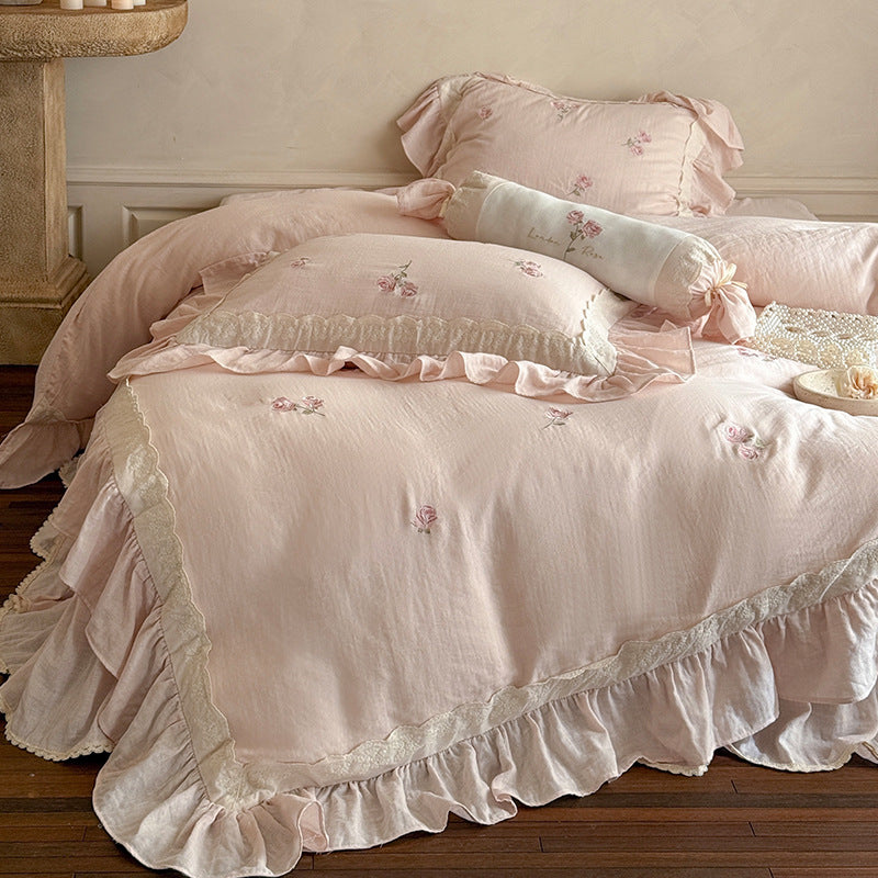 Romantic bedding set made of linen-cotton blend with ruffles and floral embroidery