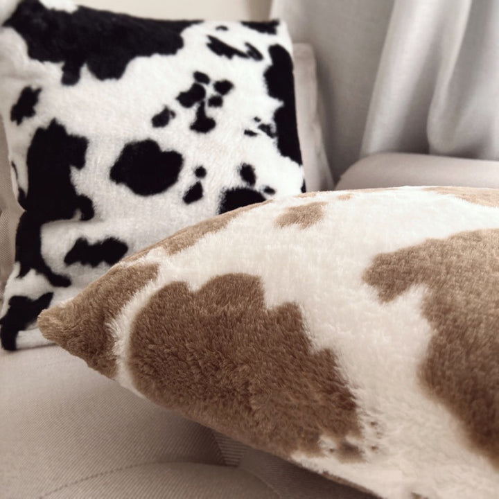 Square faux fur cushion cover with cow print pattern and extra soft plush surface Stornfield