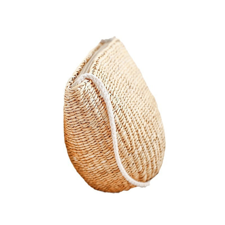 Handcrafted straw clutch with elegant design Stornfield