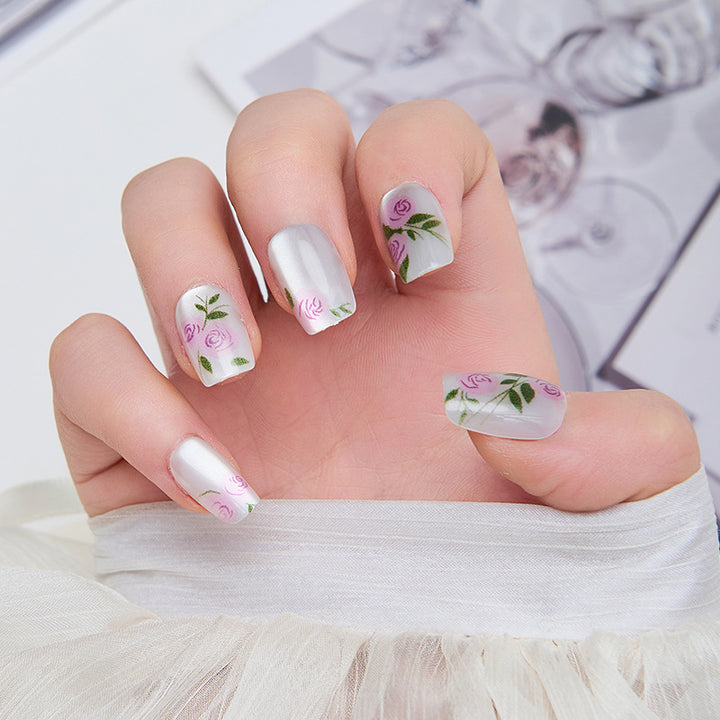 Artistic nail extensions with floral accents Stornfield