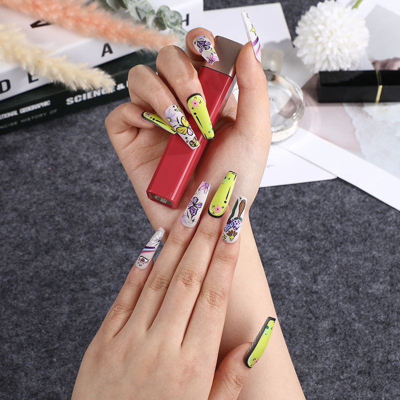 Artificial nails in creative flower design Stornfield