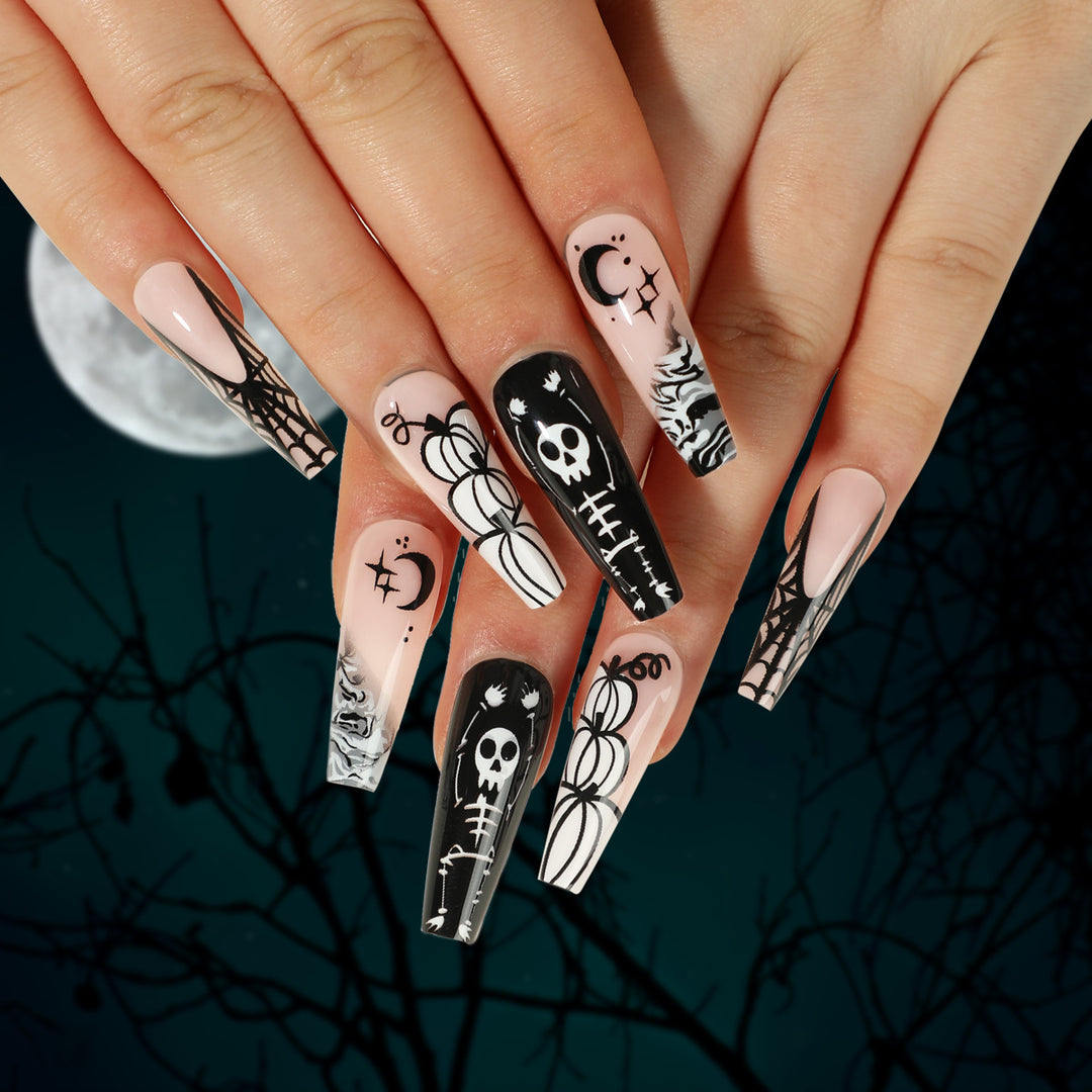 Artificial nail art in Halloween style with graffiti designs Stornfield