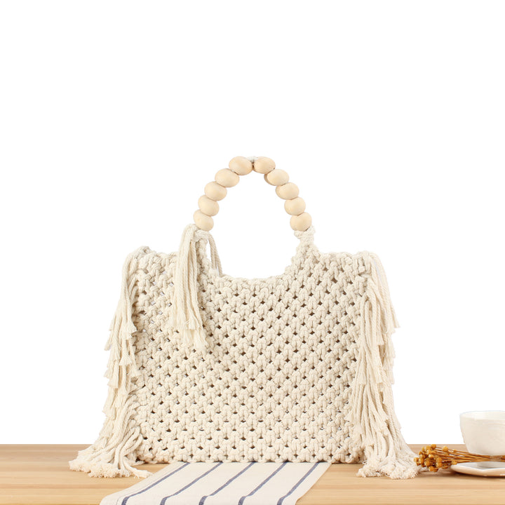 Creative crochet handbag with decorative fringes Stornfield