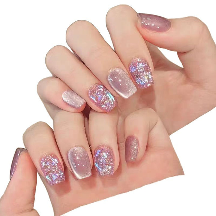 Acrylic nails with glitter accents and modern designs Stornfield