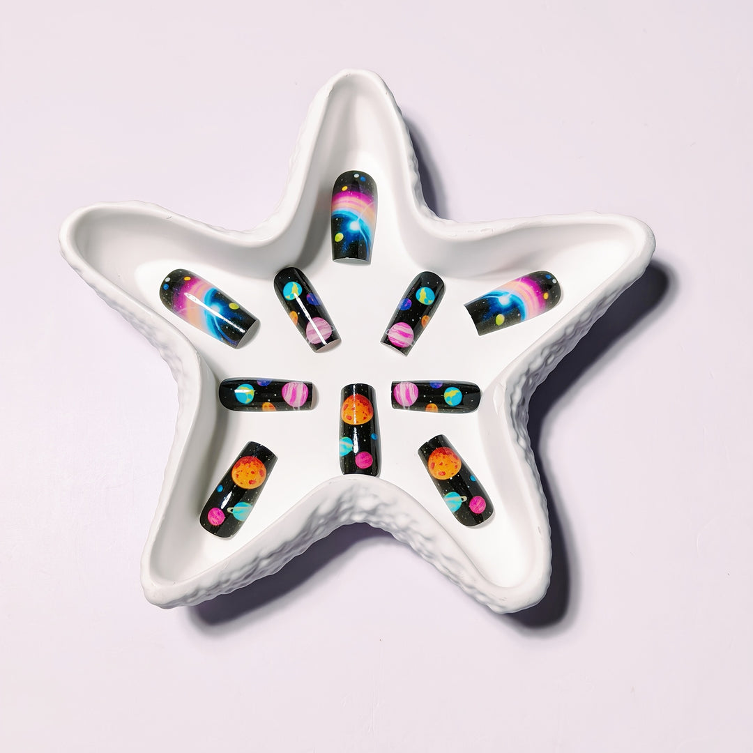 Artificial nails with Galactic Planet design Stornfield