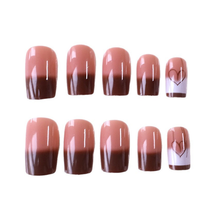 Artistic Heart-Embellished Nail Design Stornfield