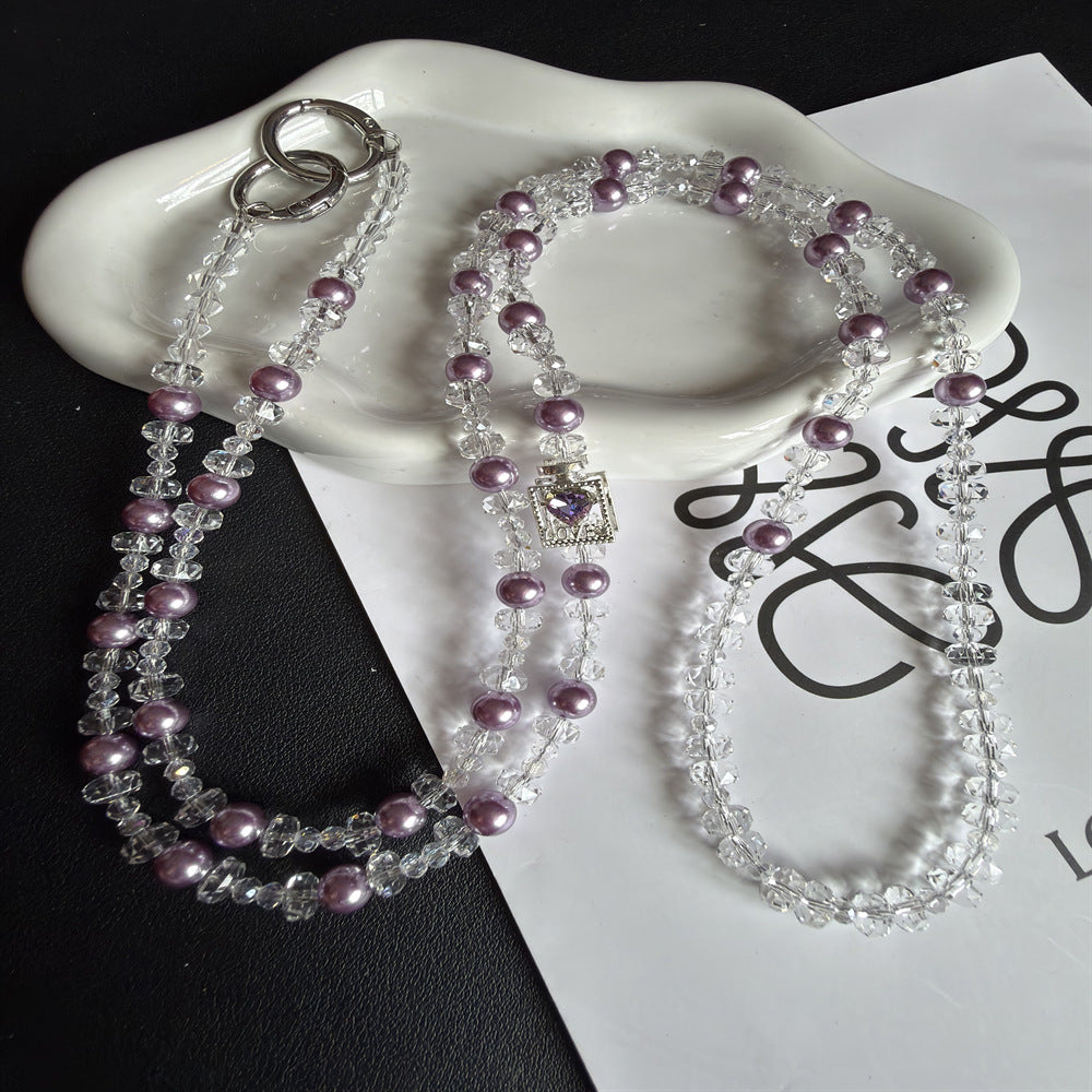 Elegant Pearl and Crystal Eyewear Holder Stornfield