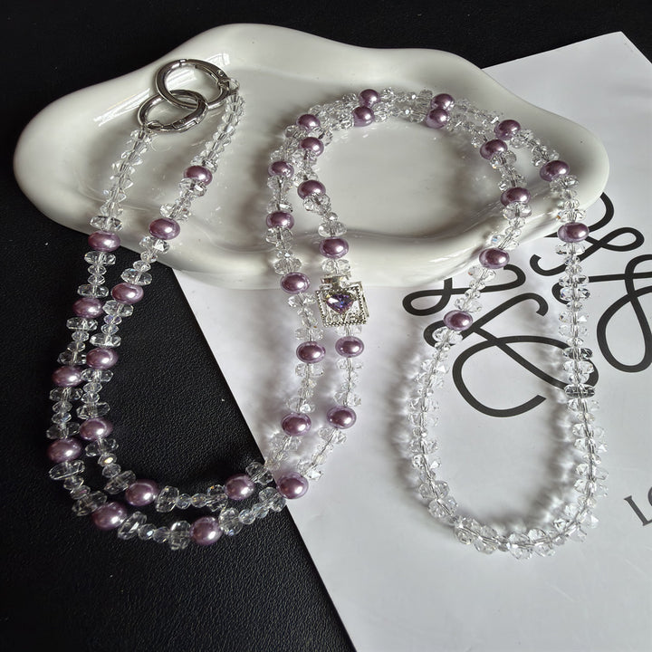 Elegant Pearl and Crystal Eyewear Holder Stornfield