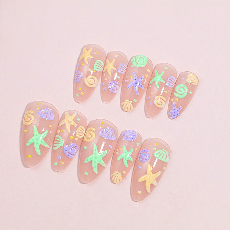 Artistic Press-On Nail Design with Ocean-Inspired Accents Stornfield