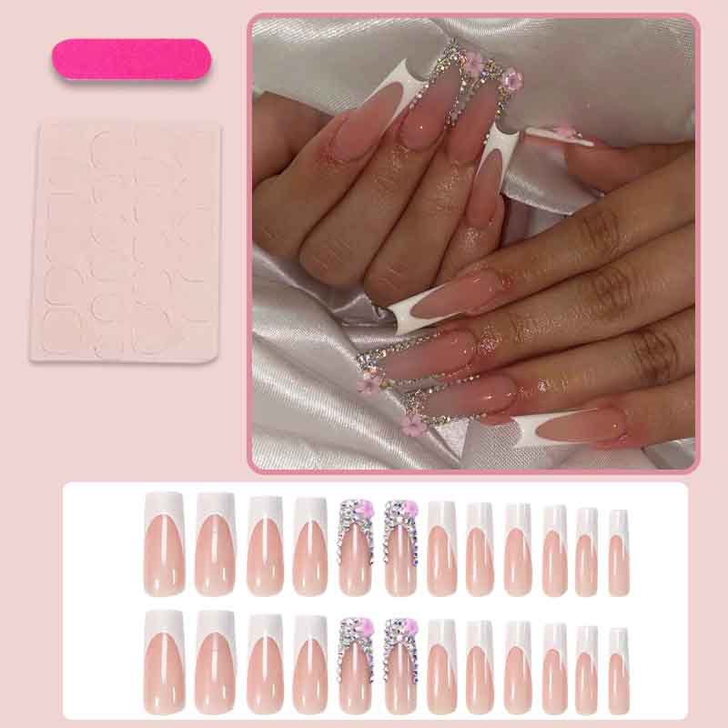 Art nail set with elegant glitter and floral accents Stornfield
