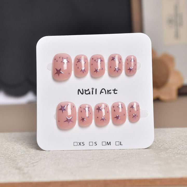 Decorative Press-On Nail Extensions with Floral Accents Stornfield
