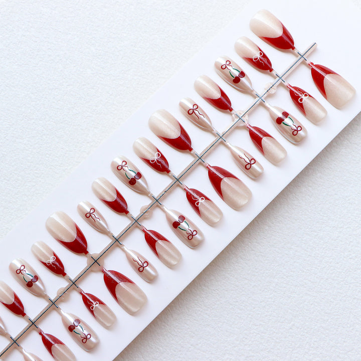 Artistic Press-On Nail Set with Cherry and Ribbon Design Stornfield
