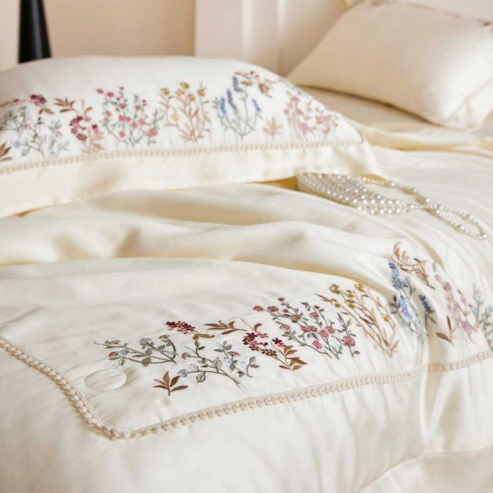Exclusive satin bed linen set with fine floral embroidery and silky finish
