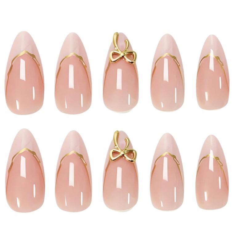 Artificial nails with elegant tip decorations and golden accents Stornfield