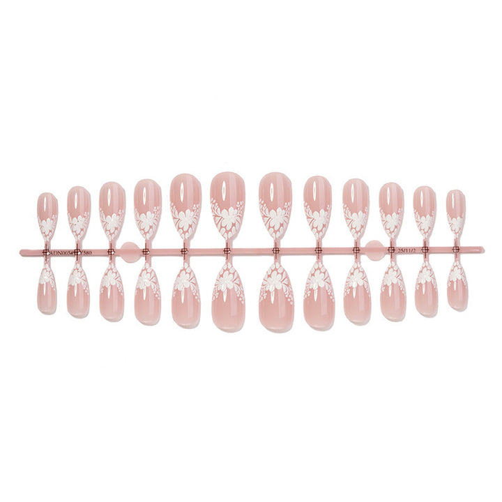 Artificial nail set with delicate floral decorations and translucent finish Stornfield