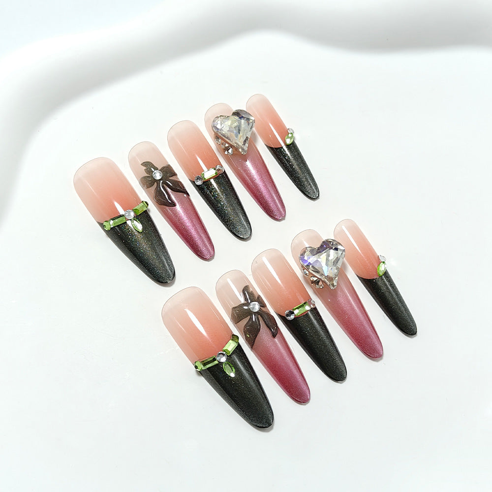 Artificial nails with elegant tip design and glitter accents Stornfield