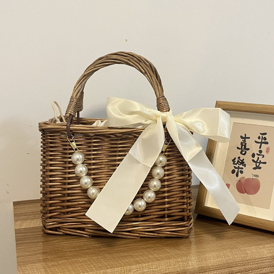 Ladies' basket bag with decorative pearl accents and bow decoration Stornfield