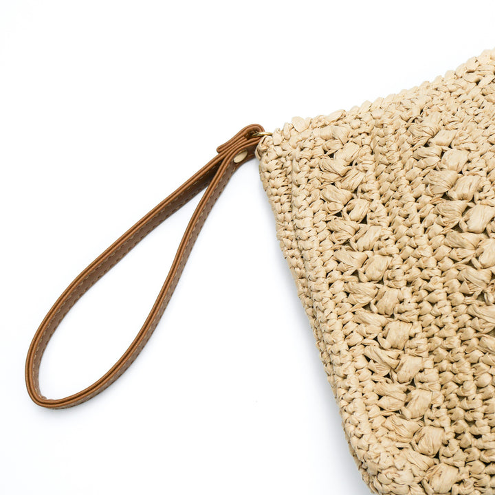 Woven natural material handbag with tassel Stornfield