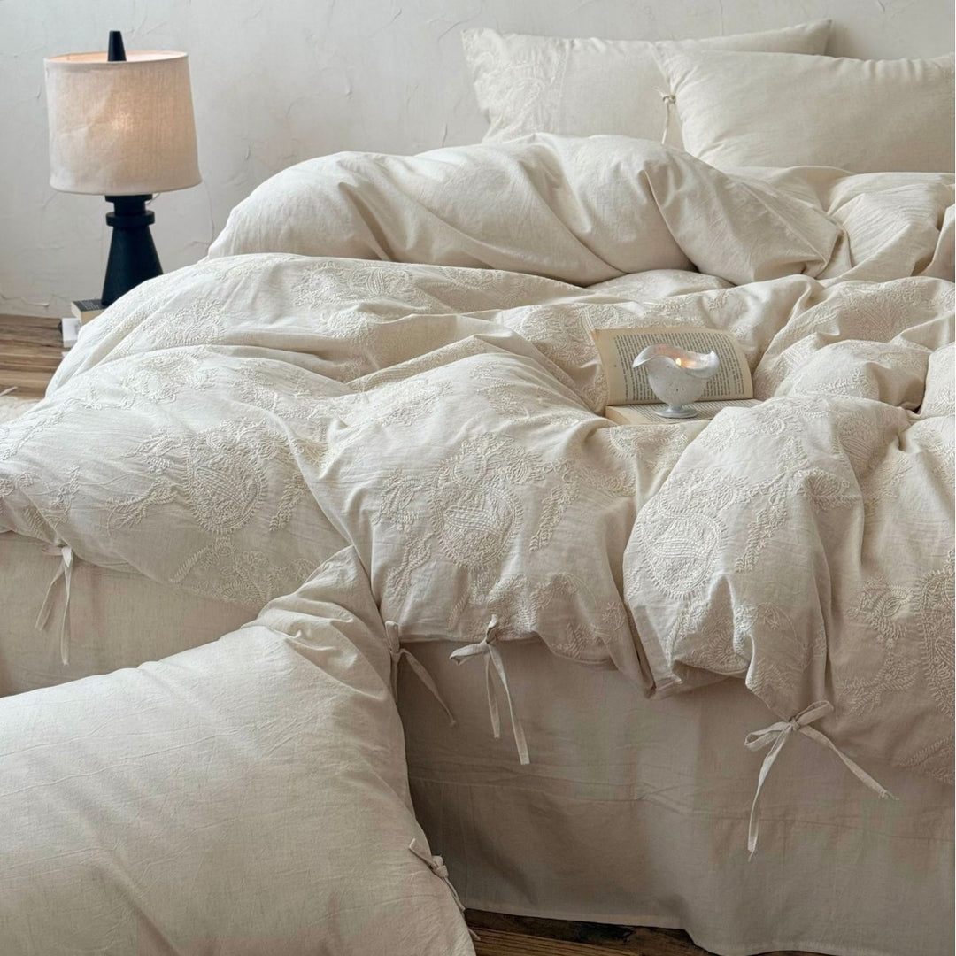 Luxurious cotton bedding set with embroidered paisley design and ties