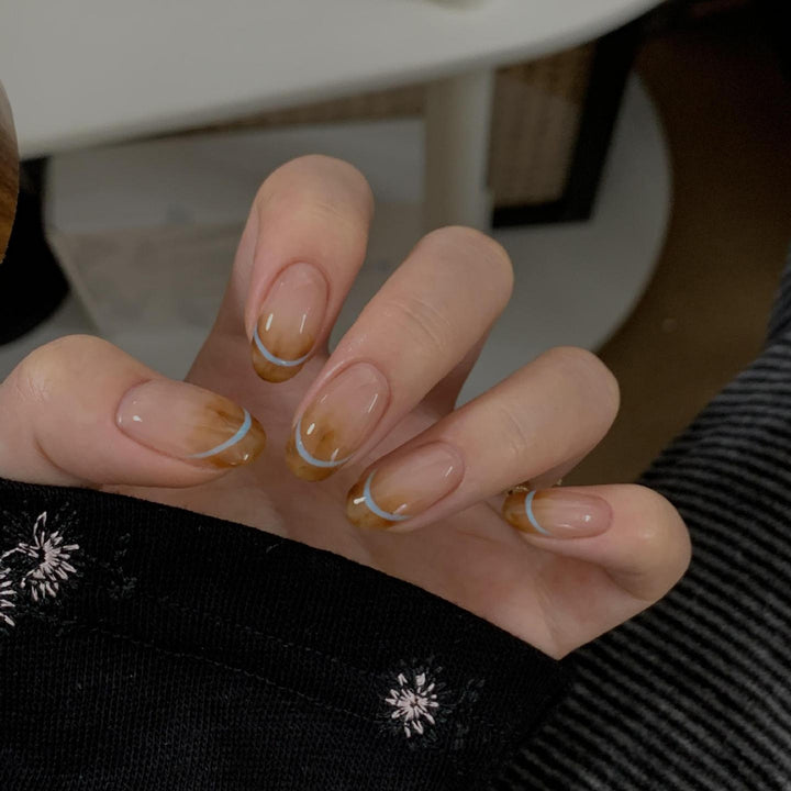Artificial nails with modern French manicure design Stornfield