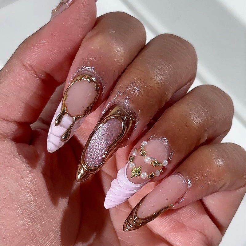 Acrylic nail set with luxurious pink designs and glamorous decorations Stornfield