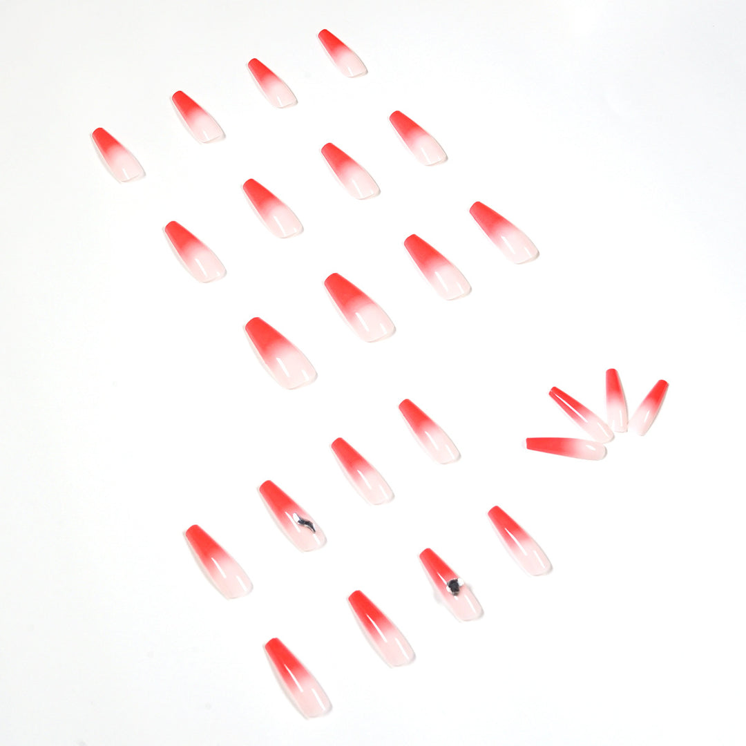 Artful stiletto nails with elegant gradient and rhinestone embellishment Stornfield