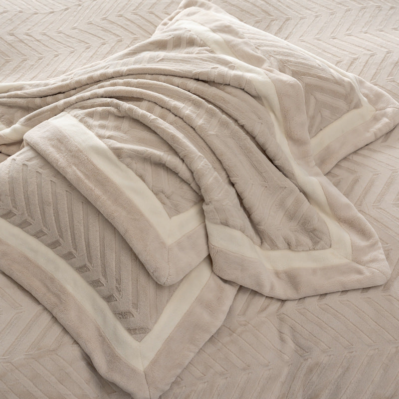 Padded velvet-look bedding set with chevron relief and piping edge