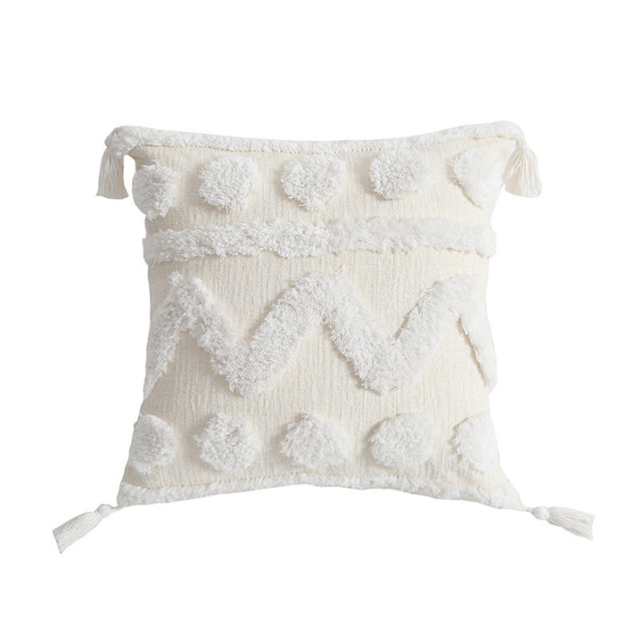 Rectangular decorative cushion cover with hand-tufted chevron and pompom relief as well as corner tassels Stornfield