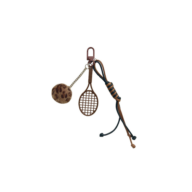 Tennis Racket and Fur Ball Keychain Stornfield