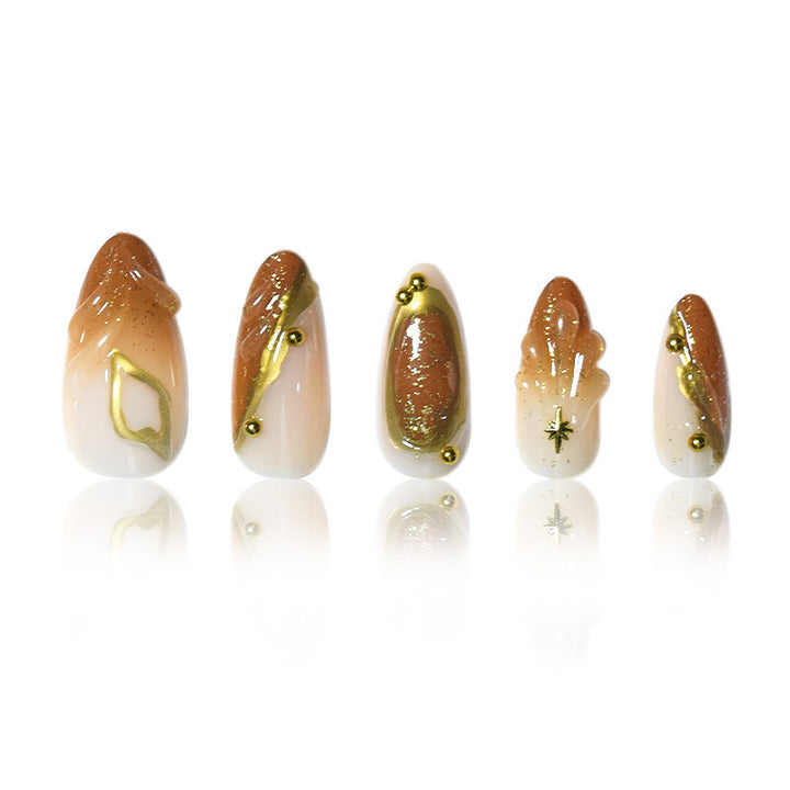 Luxurious Press-On Nail Set with Ornate Gold Detailing Stornfield