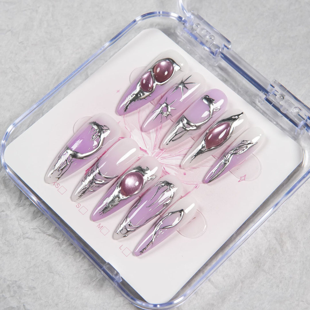 Artistic Press-On Nail Set with Metallic Accents