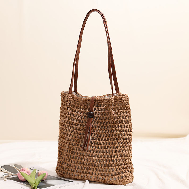 Hand-knotted basket bag with elegant leather handles Stornfield