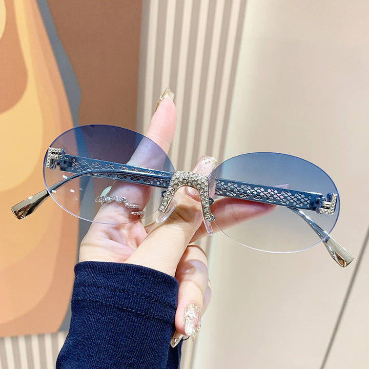 Women's sunglasses with glittering frame and oval lenses Stornfield