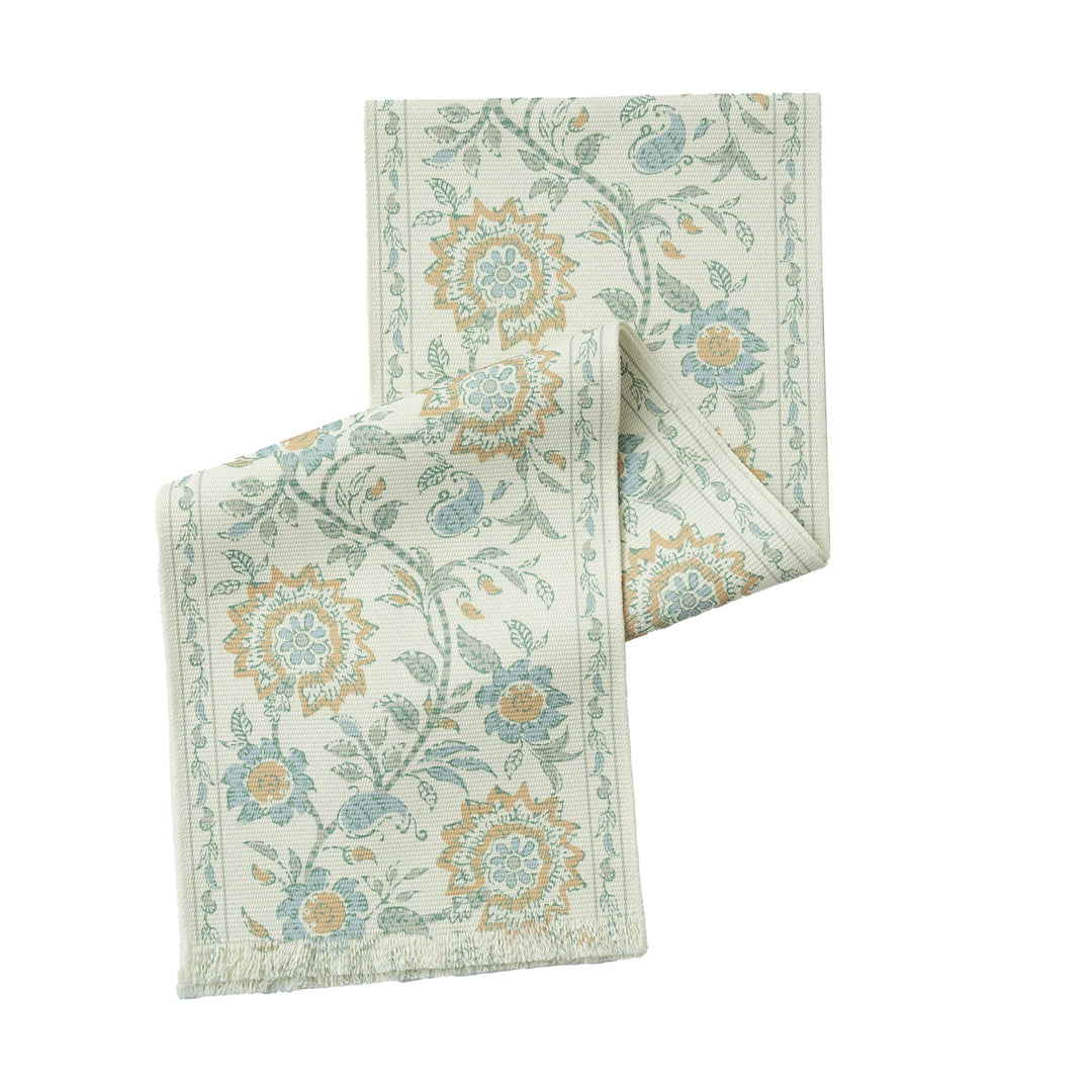 Woven runner with vintage-oriental floral pattern and fringes