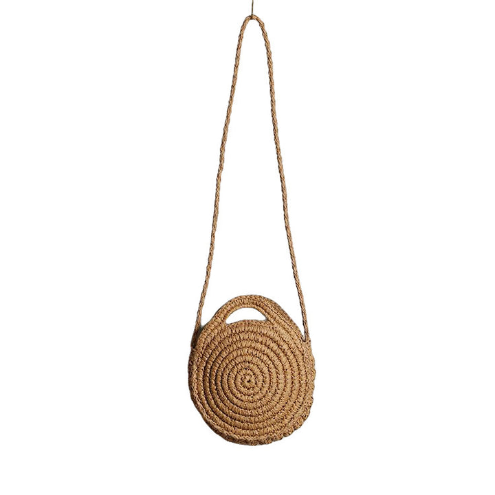 Handcrafted Round Wicker Bag with Elegant Closure Stornfield