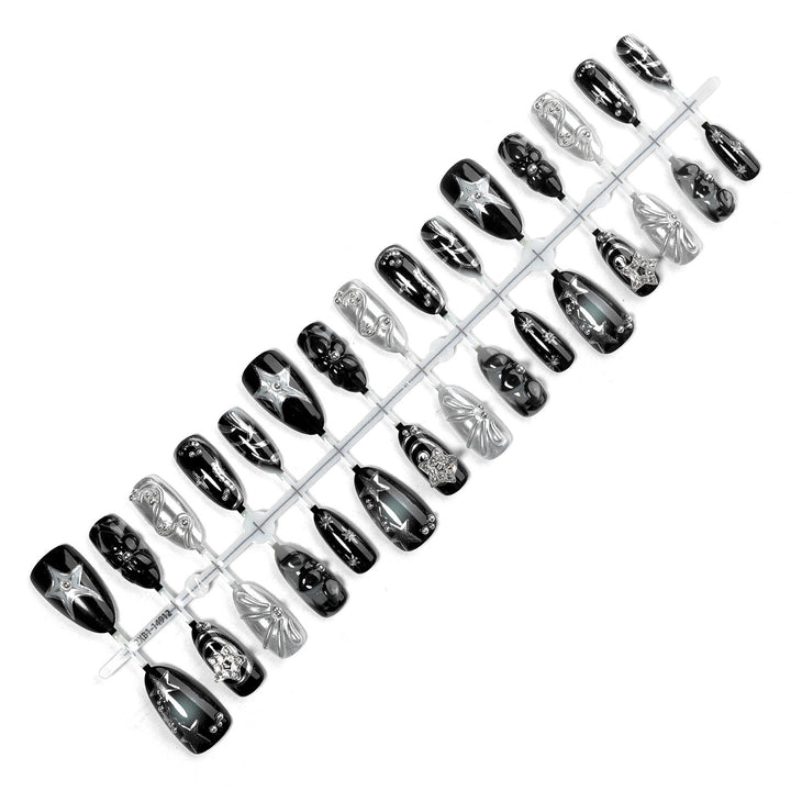 Artificial nail set with glamorous designs and unique 3D elements Stornfield