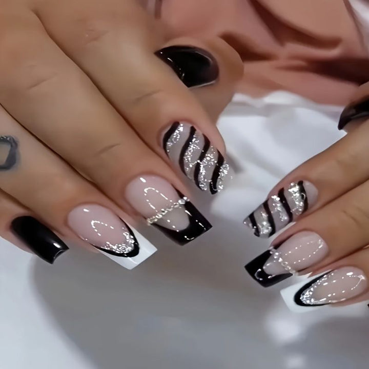 Elegant artificial nails with glitter and stripe accents Stornfield
