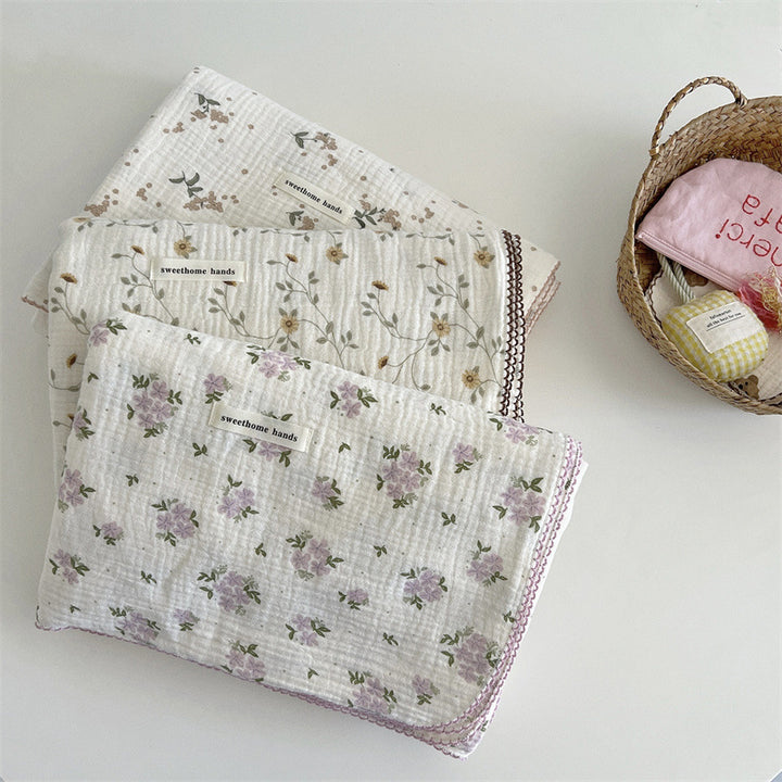 Unisex versatile muslin blanket with floral accents Stornfield